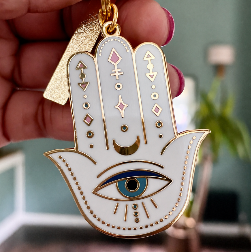 HAMSA DOUBLE-SIDED ENAMEL KEYCHAIN IN GOLD, BLUE & WHITE